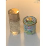 A HAND PAINTED ENAMEL POT DEPICTING POOH BEAR AND A GOLD PLATED PERFUME BOTTLE