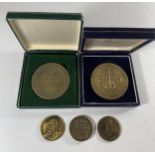 * TWO LARGE CASED PORTUGUESE BRONZE MEDALS AND THREE LITERATURE MEDALS (5)