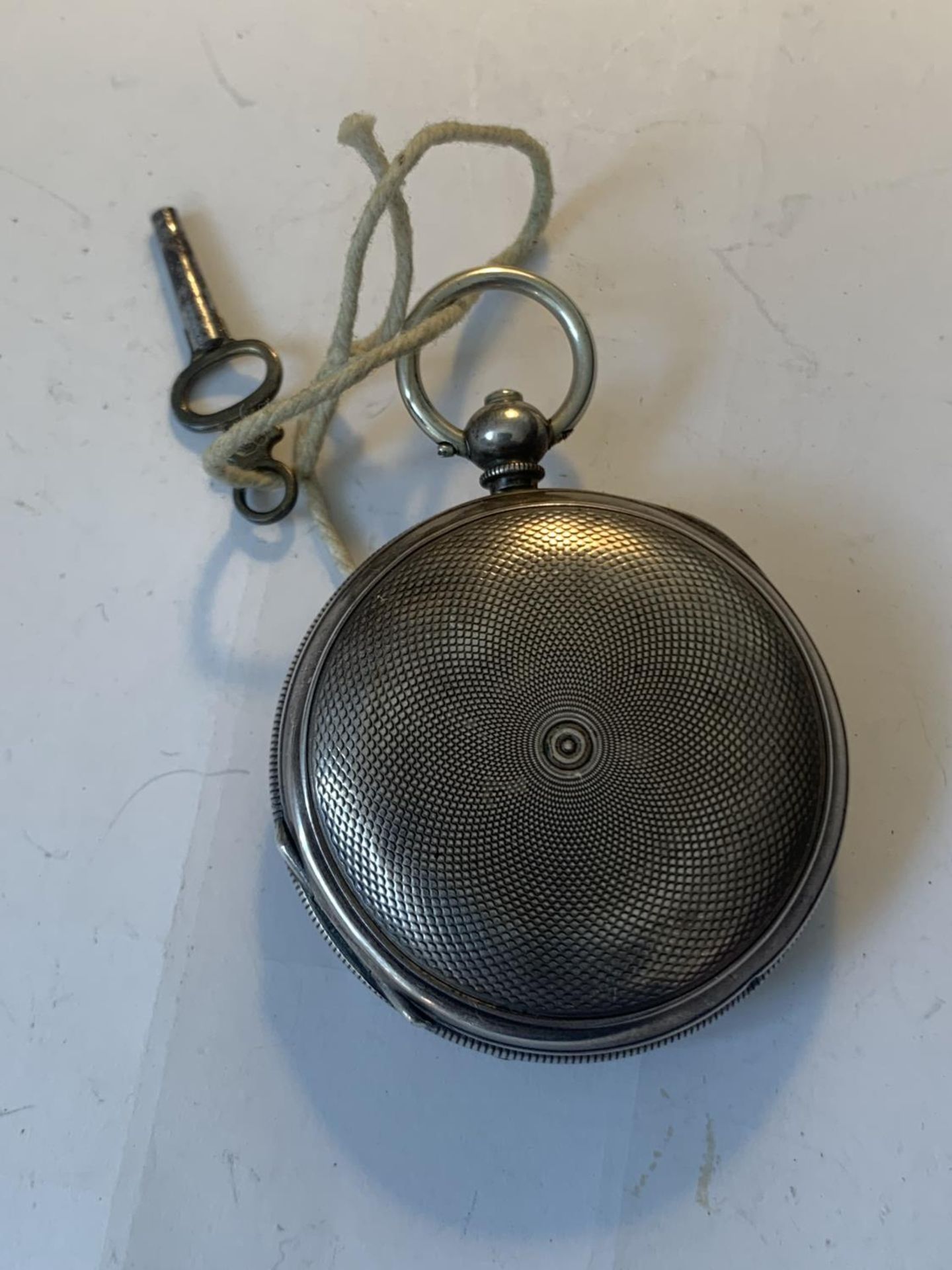 A MARKED 800 SILVER POCKET WATCH WITH WHITE ENAMEL FACE, ROMAN NUMERALS, SUB DIAL AND KEY - Image 5 of 5