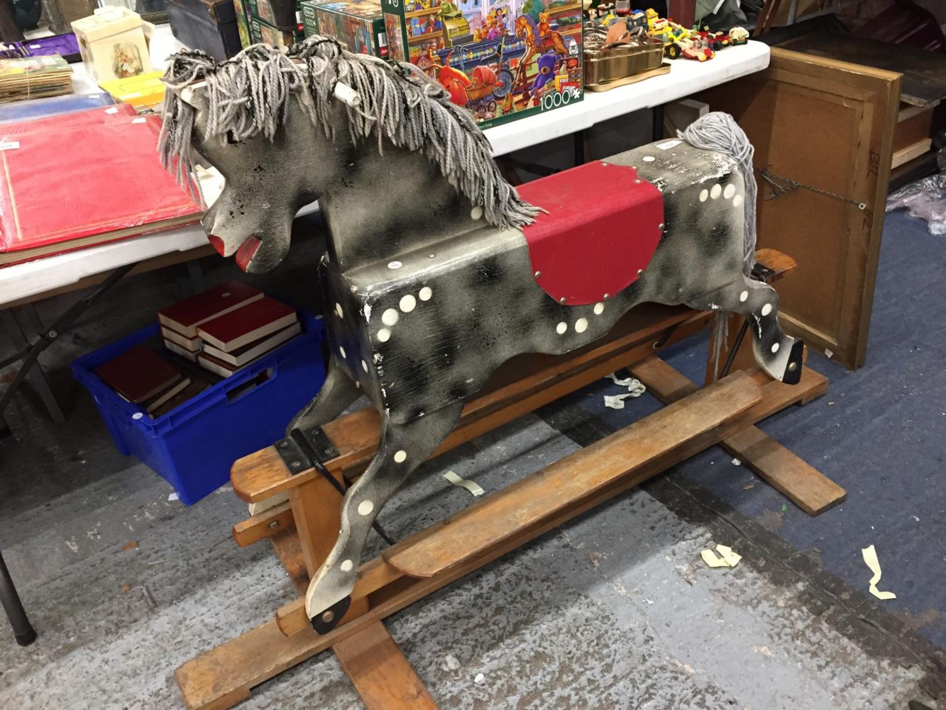 A VINTAGE CHILD'S WOODEN ROCKING HORSE HEIGHT TO THE SEAT 69CM, LENGTH 150CM