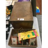 A VINTAGE MAHOGANY WORK BOX WITH UP LID AND INNER COMPARTMENT CONTAINING BUTTONS, NEEDLES, ETC