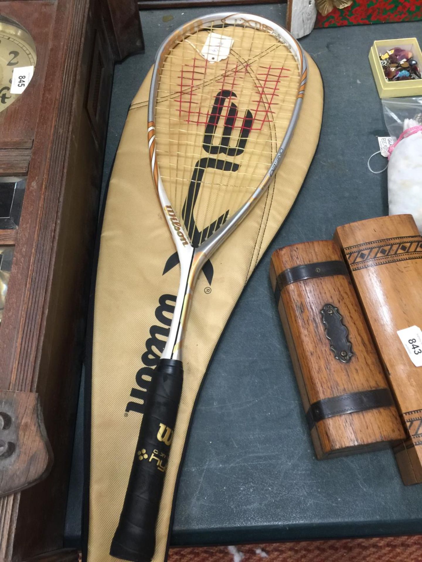 A WILSON HYBRID RACKET WITH COVER