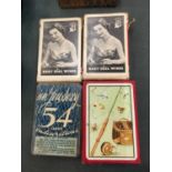 FOUR PACKETS OF VINTAGE PLAYING CARDS