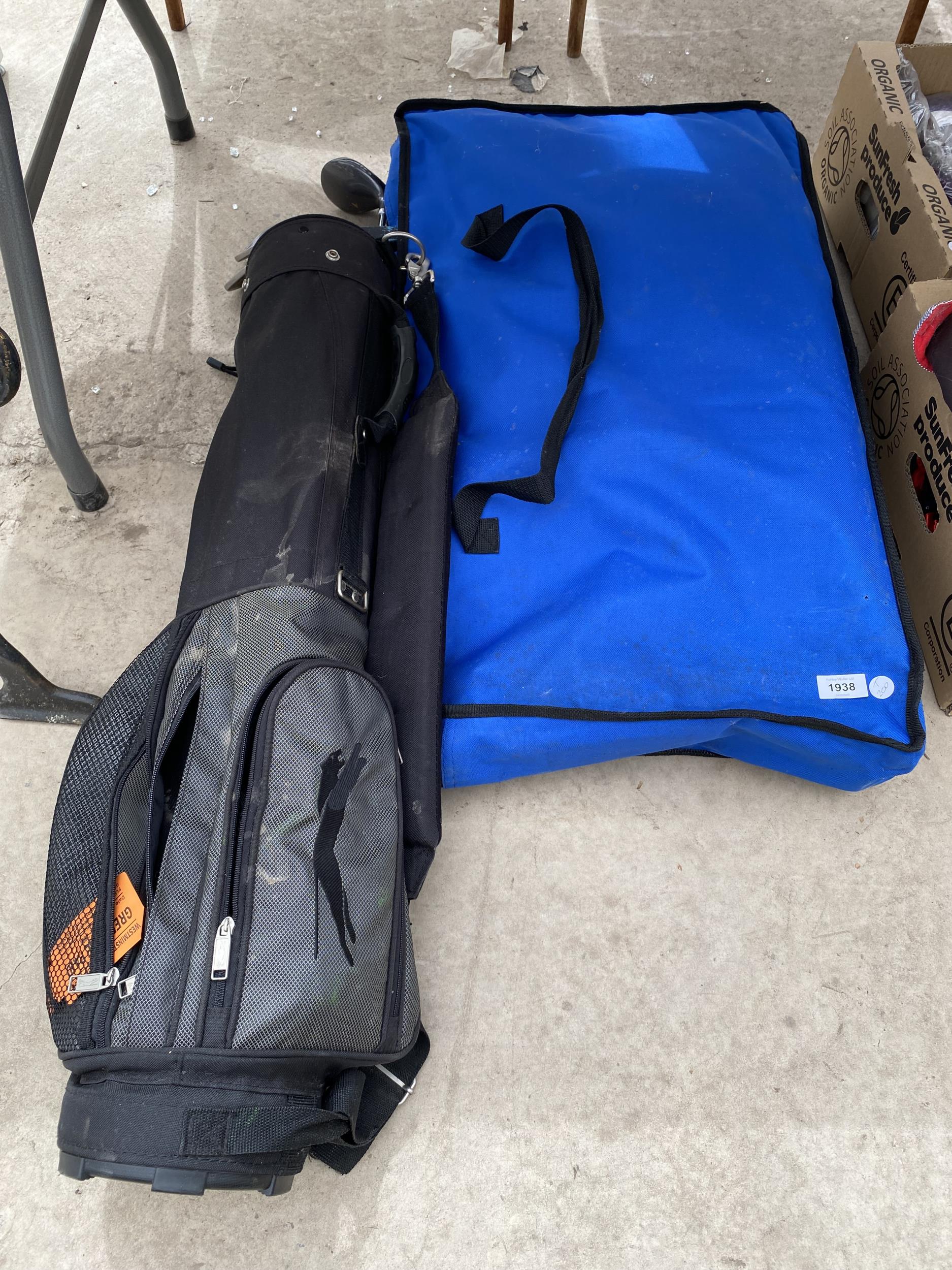 A SET OF GOLF CLUBS AND FOLDING TABLE IN BAG