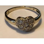 A 9 CARAT GOLD HEART SHAPED RING WITH CUBIC ZICINIA STONES SIZE Q