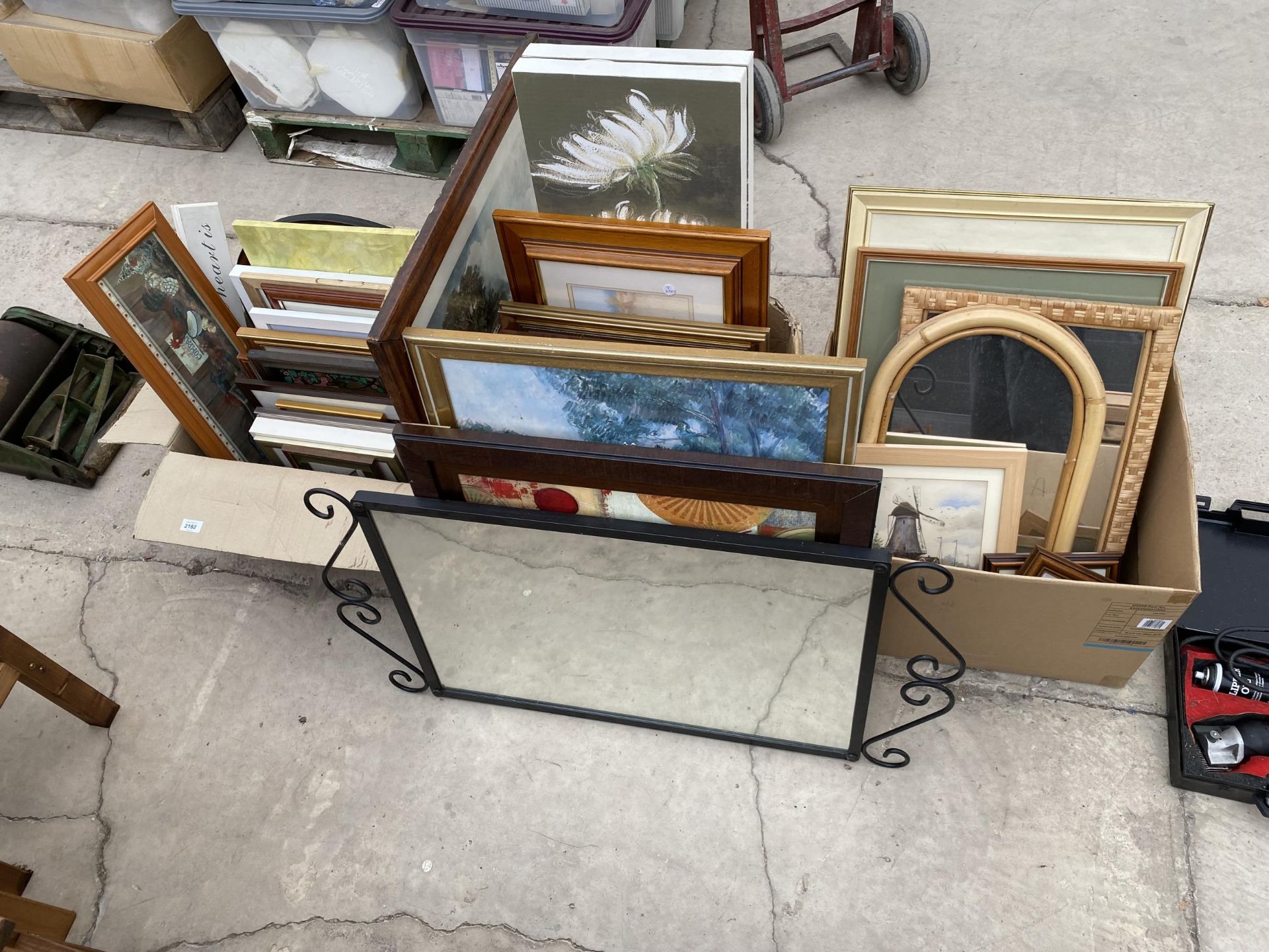 A LARGE ASSORTMENT OF FRAMED PRINTS, PICTURES AND MIRRORS ETC