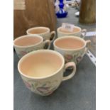 FIVE SUSIE COOPER FLORAL DESIGN CUPS