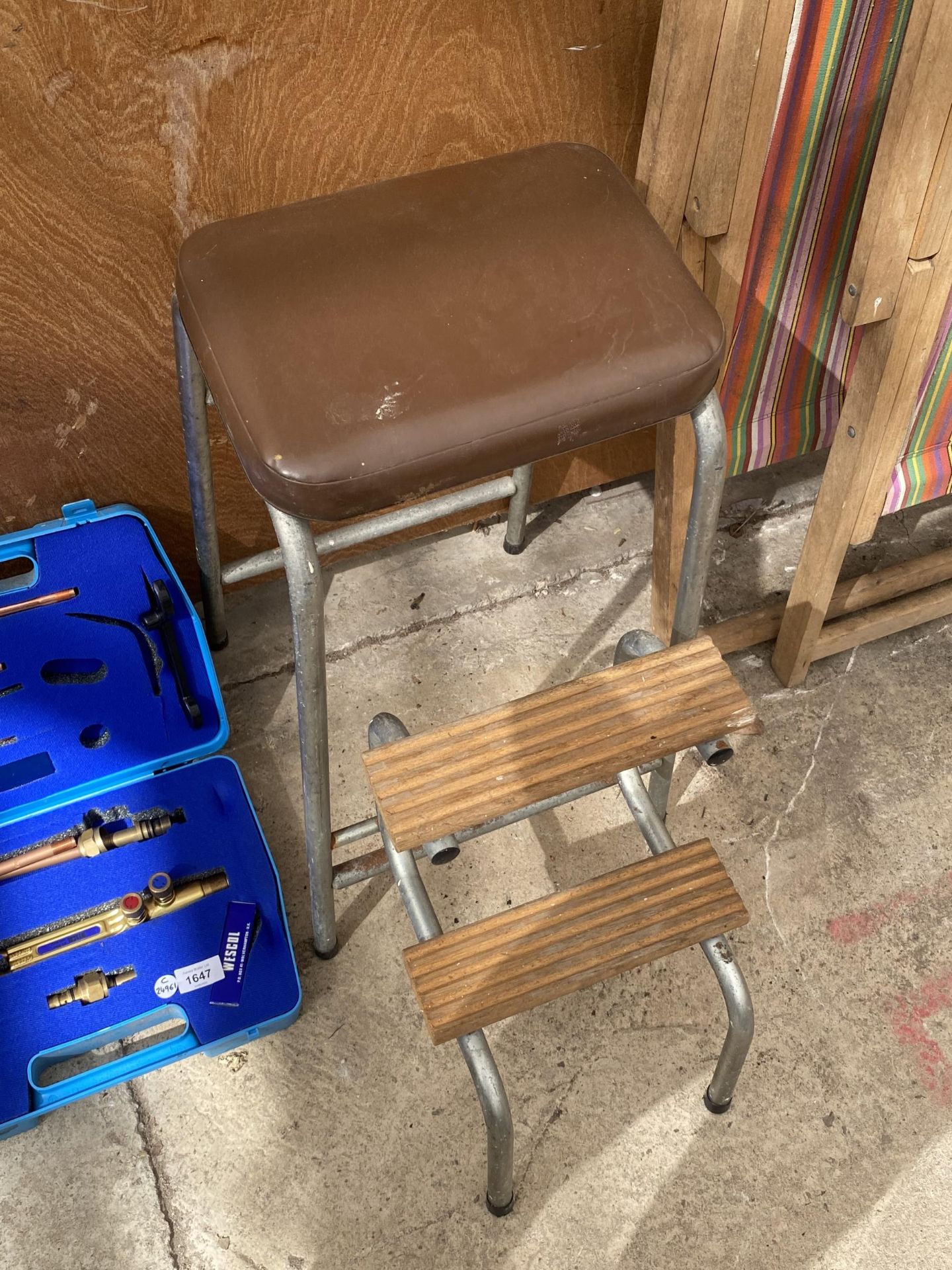 A VINTAGE TUBULAR METAL FOLDING BENCH / STEPS