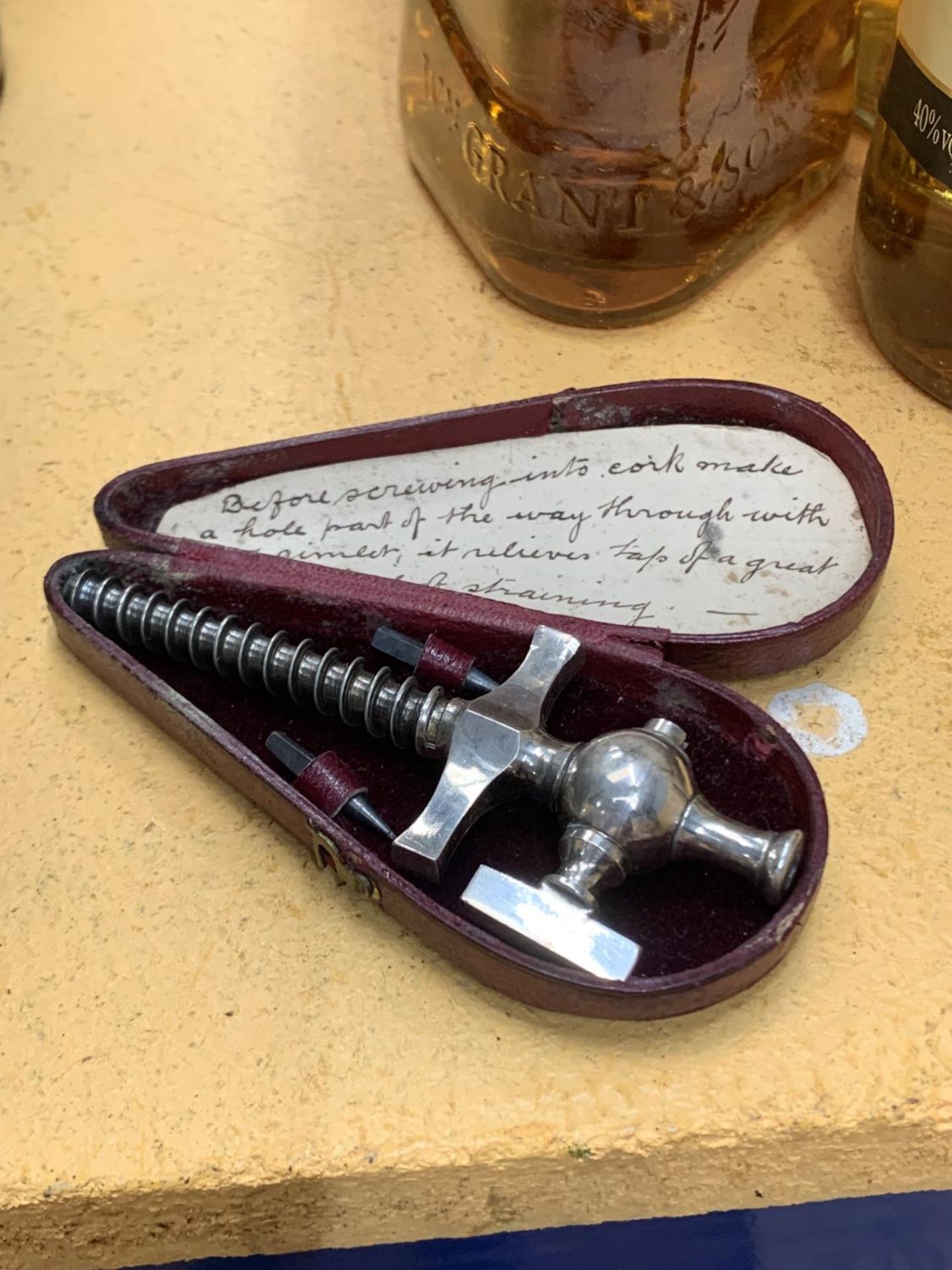 A VINTAGE MINI CHAMPAGNE TAP IN A PRESENTATION BOX