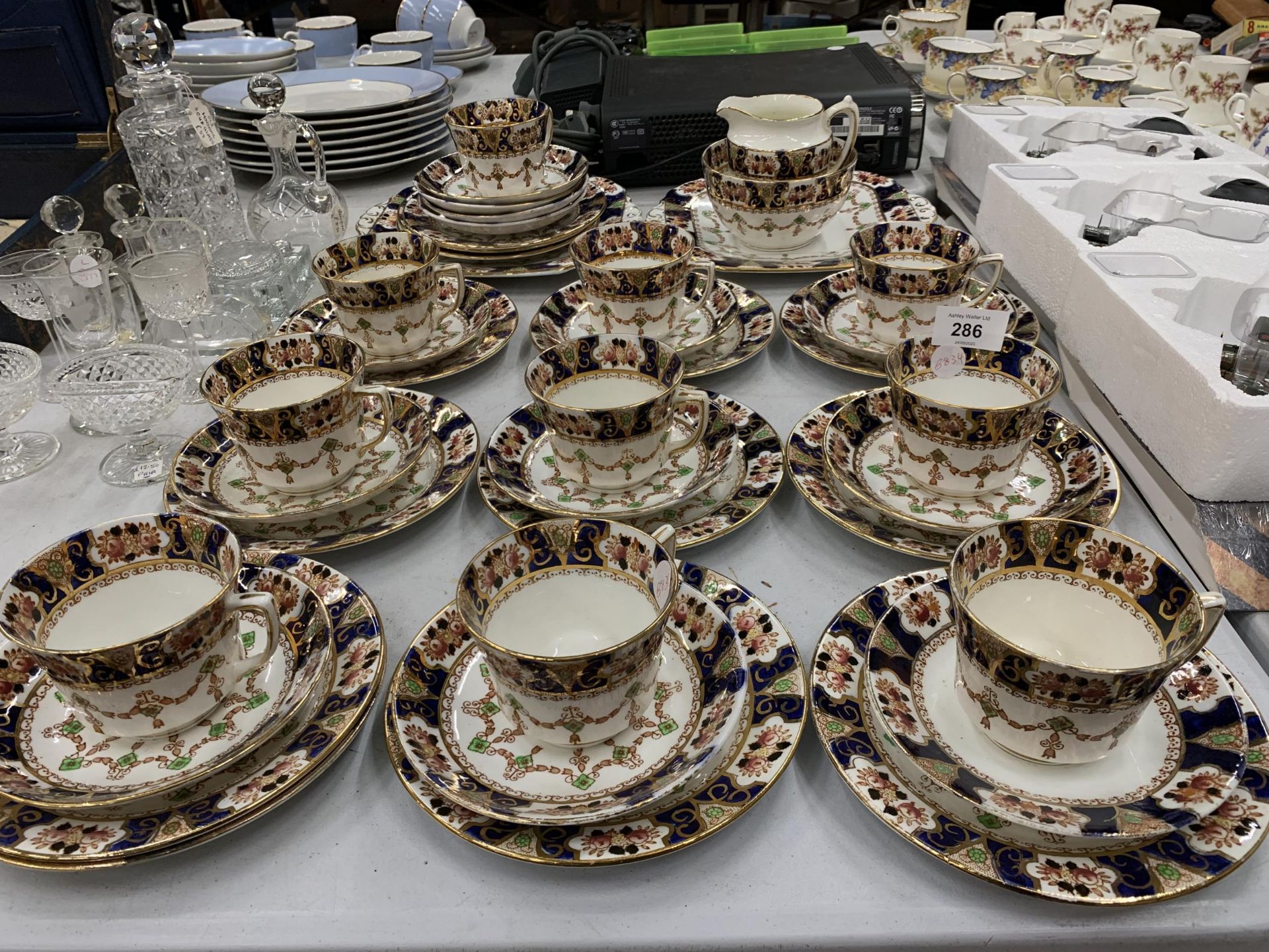 A LARGE EDWARDIAN TEA SET, CUPS, SAUCERS, SIDE PLATES ETC - Image 3 of 5