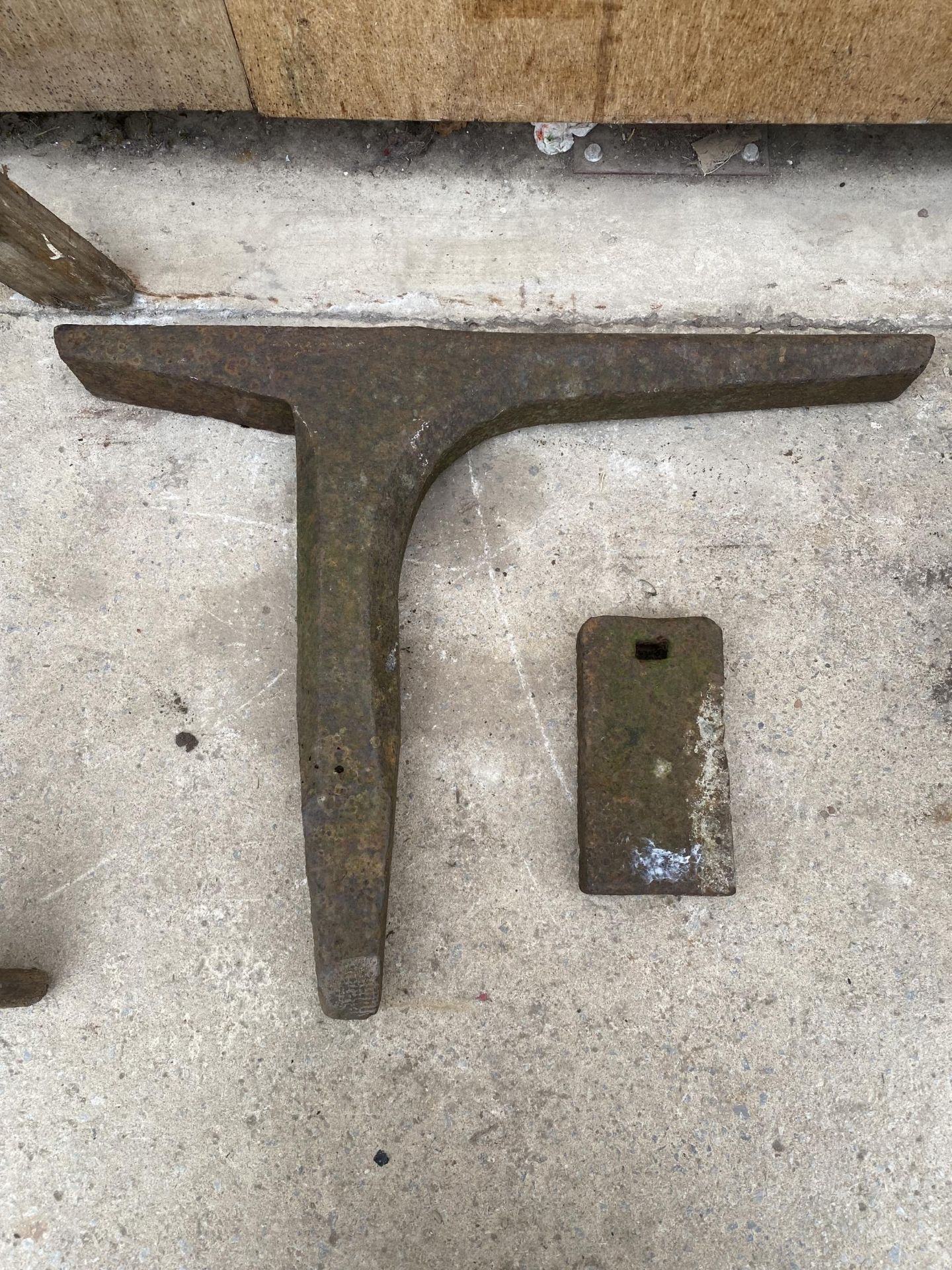 TWO VINTAGE CAST IRON FORGING TOOLS