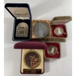 * A COLLECTION OF CASED MEDALS RELATING TO SPORT, BANKING AND RUSSIA