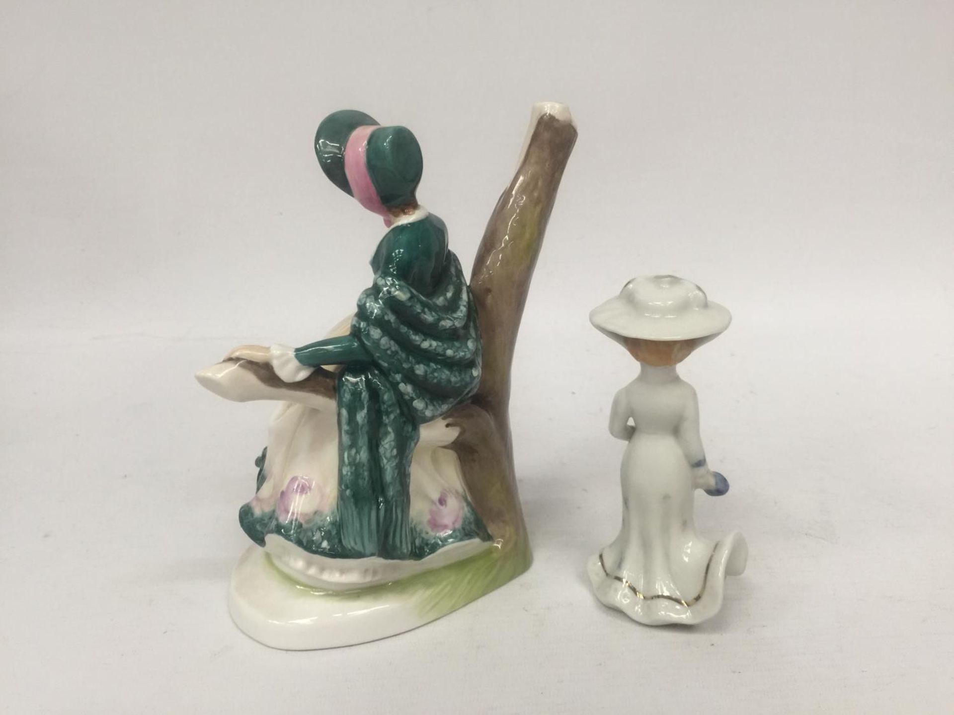 A FINE BONE CHINA FIGURE OF A LADY SITTING IN A BRANCH "EMILY" TOGETHER WITH A SMALL PORCELAIN LADY - Image 3 of 4