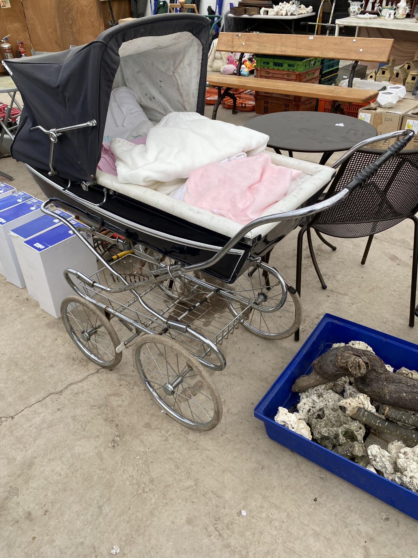 A VINTAGE SILVER CROSS PRAM