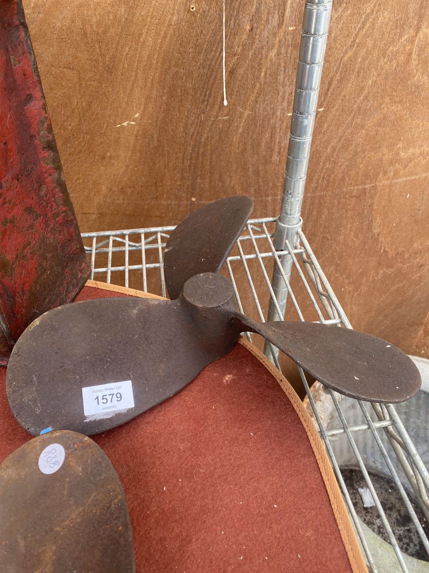 A VINTAGE METAL PROPELLER