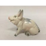 A VINTAGE 1950'S BESWICK SEATED PIG