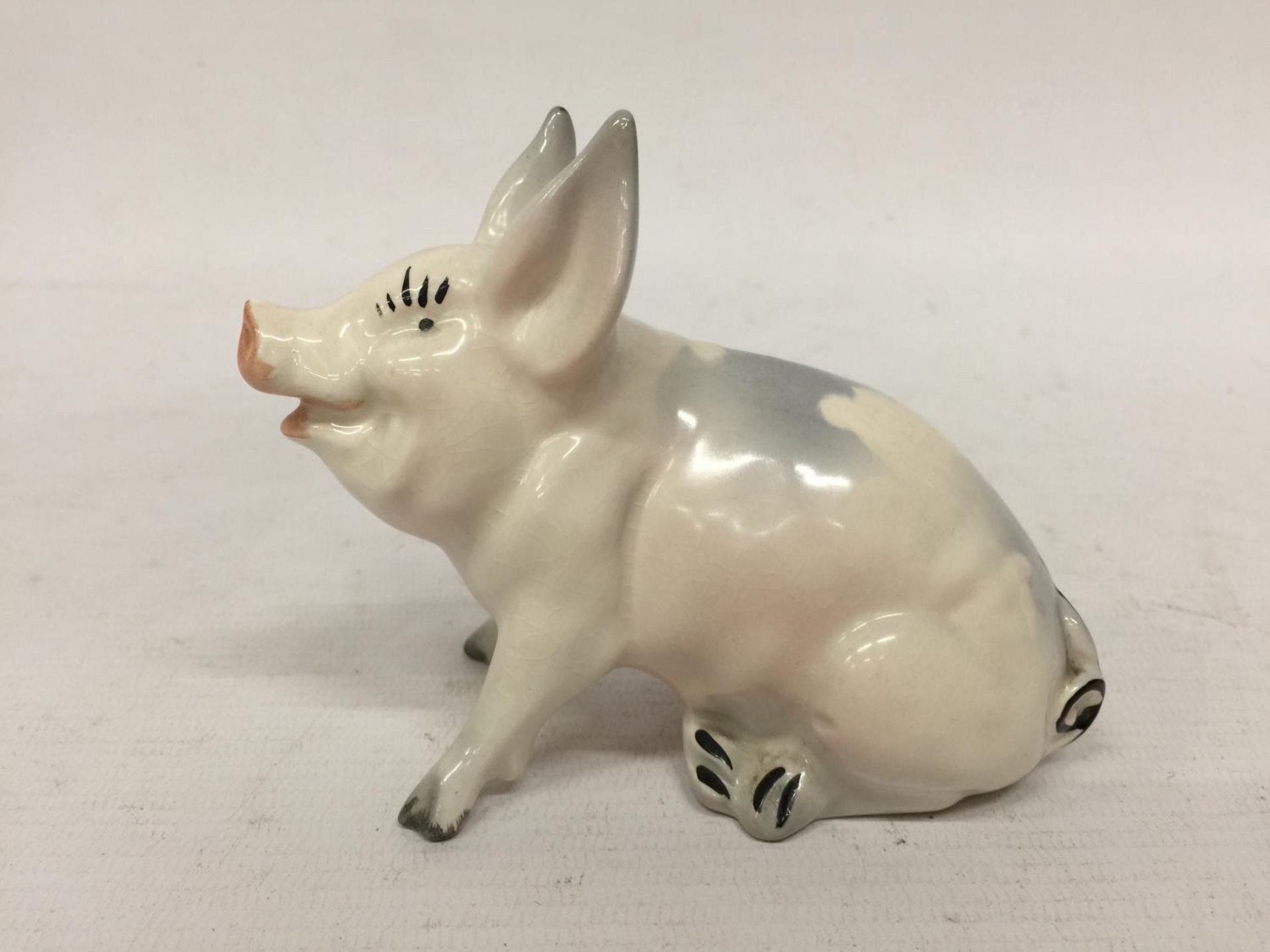 A VINTAGE 1950'S BESWICK SEATED PIG