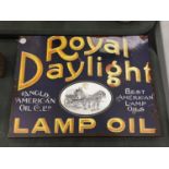 A 'ROYAL DAYLIGHT LAMP OIL' TIN SIGN 40CM X 30CM