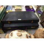 A VINTAGE LEATHER JOHN BAGSHAW AND SONS SUITCASE WITH A FRONT POCKET FOR GROOMING ESSENTIALS