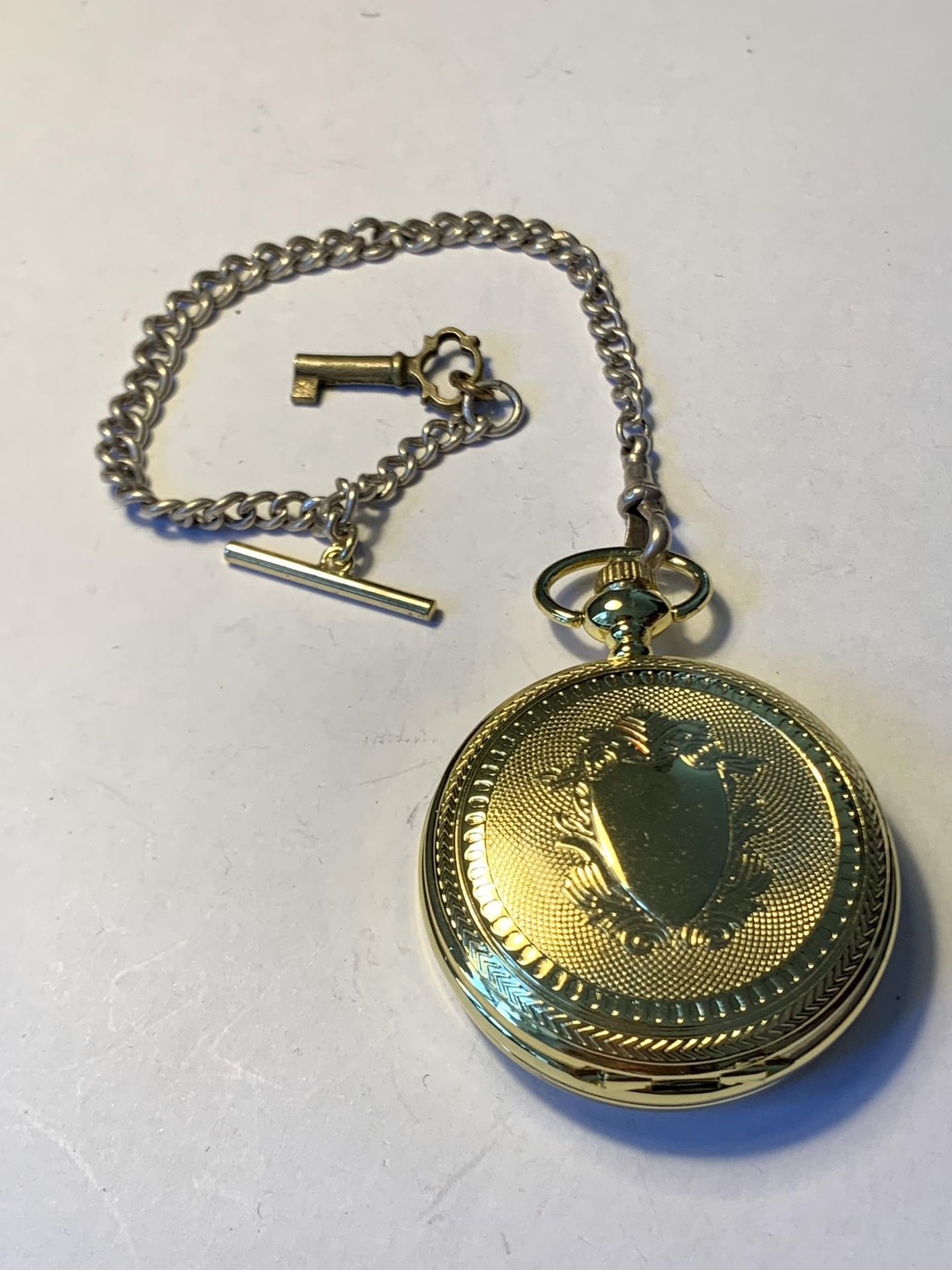 A SILVER HALF ALBERT CHAIN AND POCKET WATCH