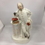 A LARGE ANTIQUE STAFFORDSHIRE FIGURE OF SHAKESPEARE HEIGHT 47CM - A/F MISSING ONE ARM