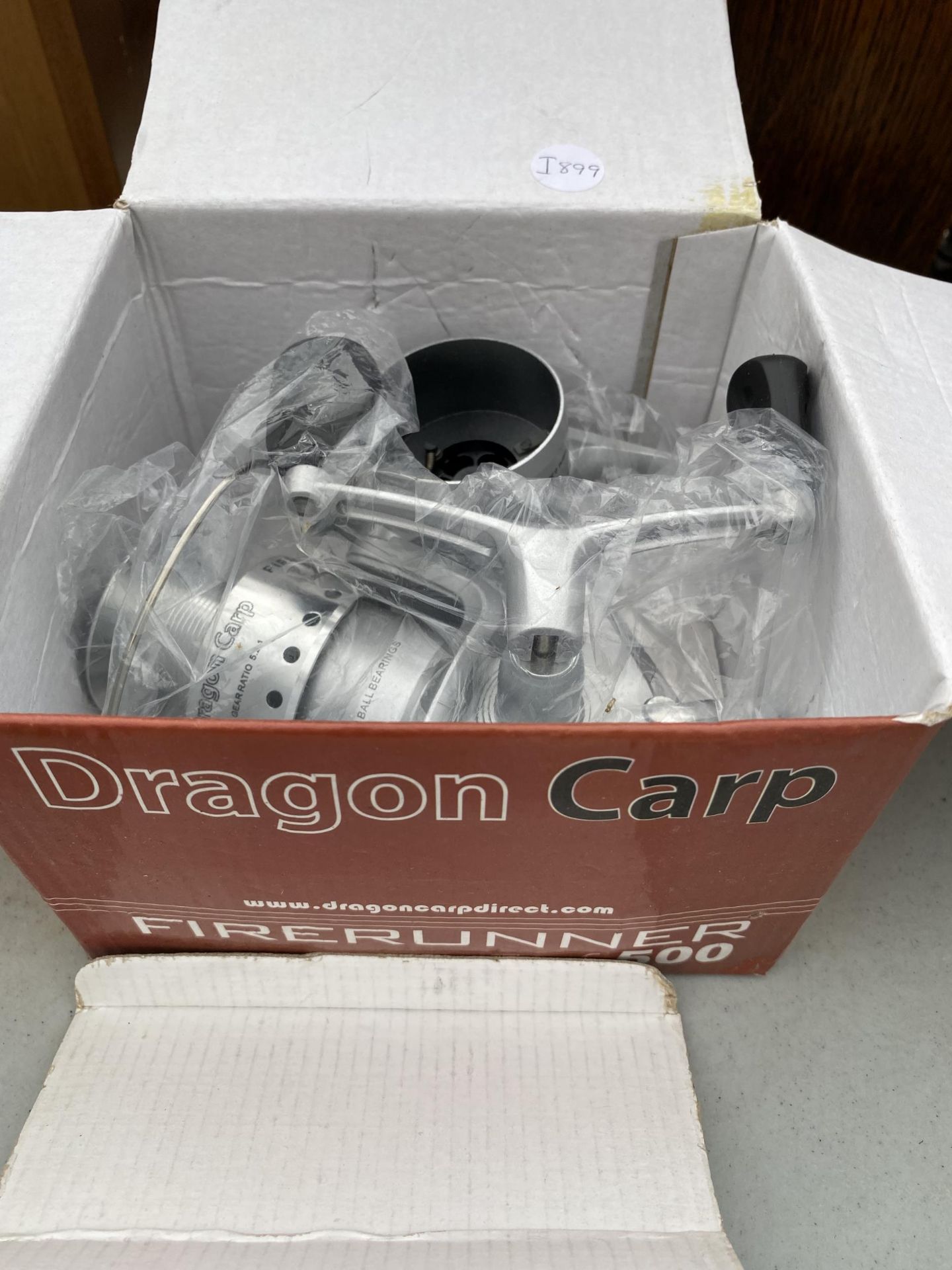 THREE BOXED FISHING REELS, DRAGON CARP ETC - Image 4 of 7