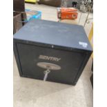 A SENTRY METAL SAFE BOX WITH KEY