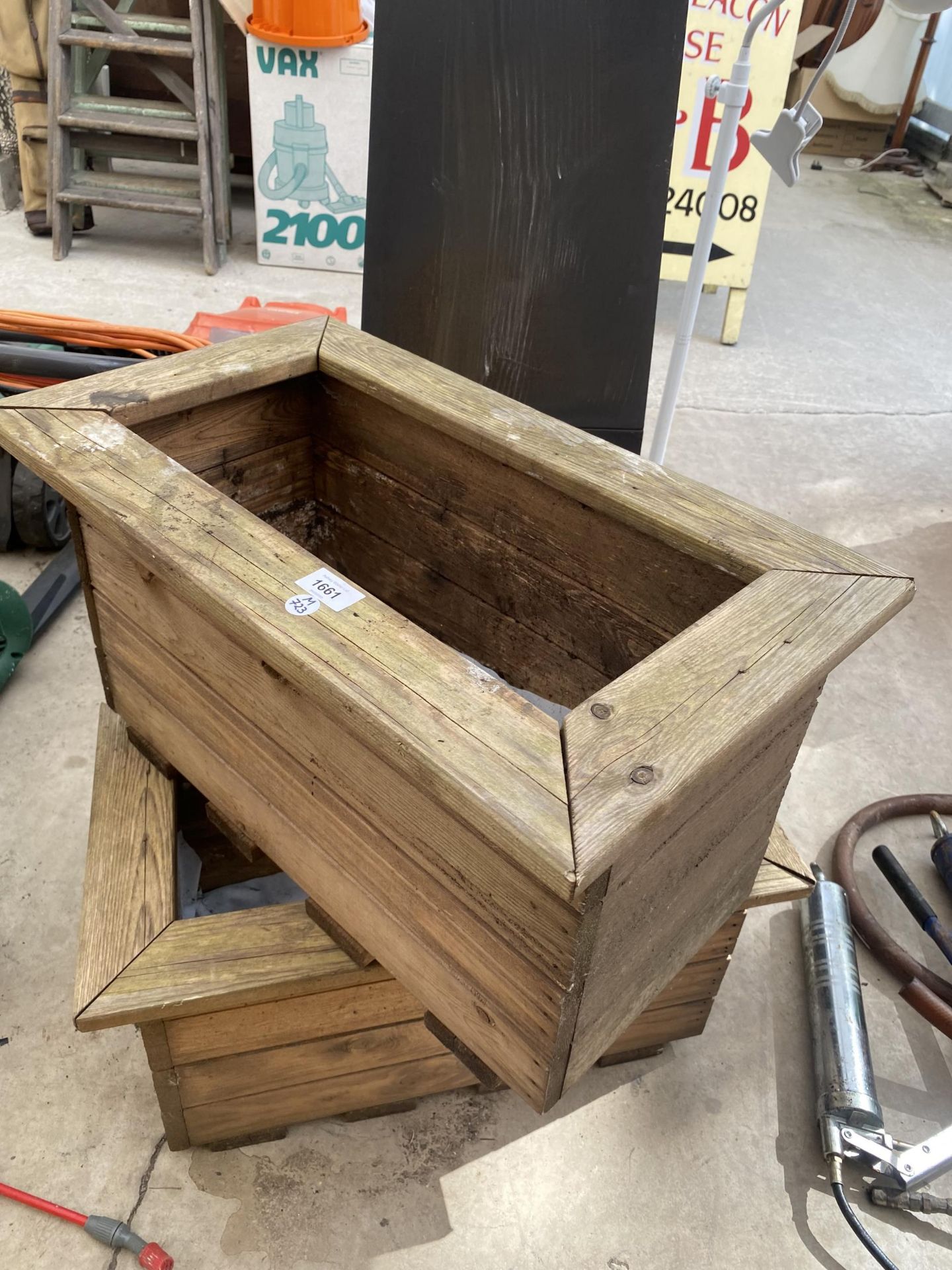 TWO RECTANGULAR WOODEN GARDEN PLANTERS