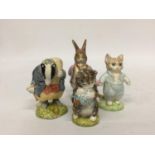 FOUR ROYAL ALBERT BEATRIX POTTER FIGURES TO INCLUDE TOMMY BROCK, TOM KITTEN, BENJAMIN BUNNY AND MISS