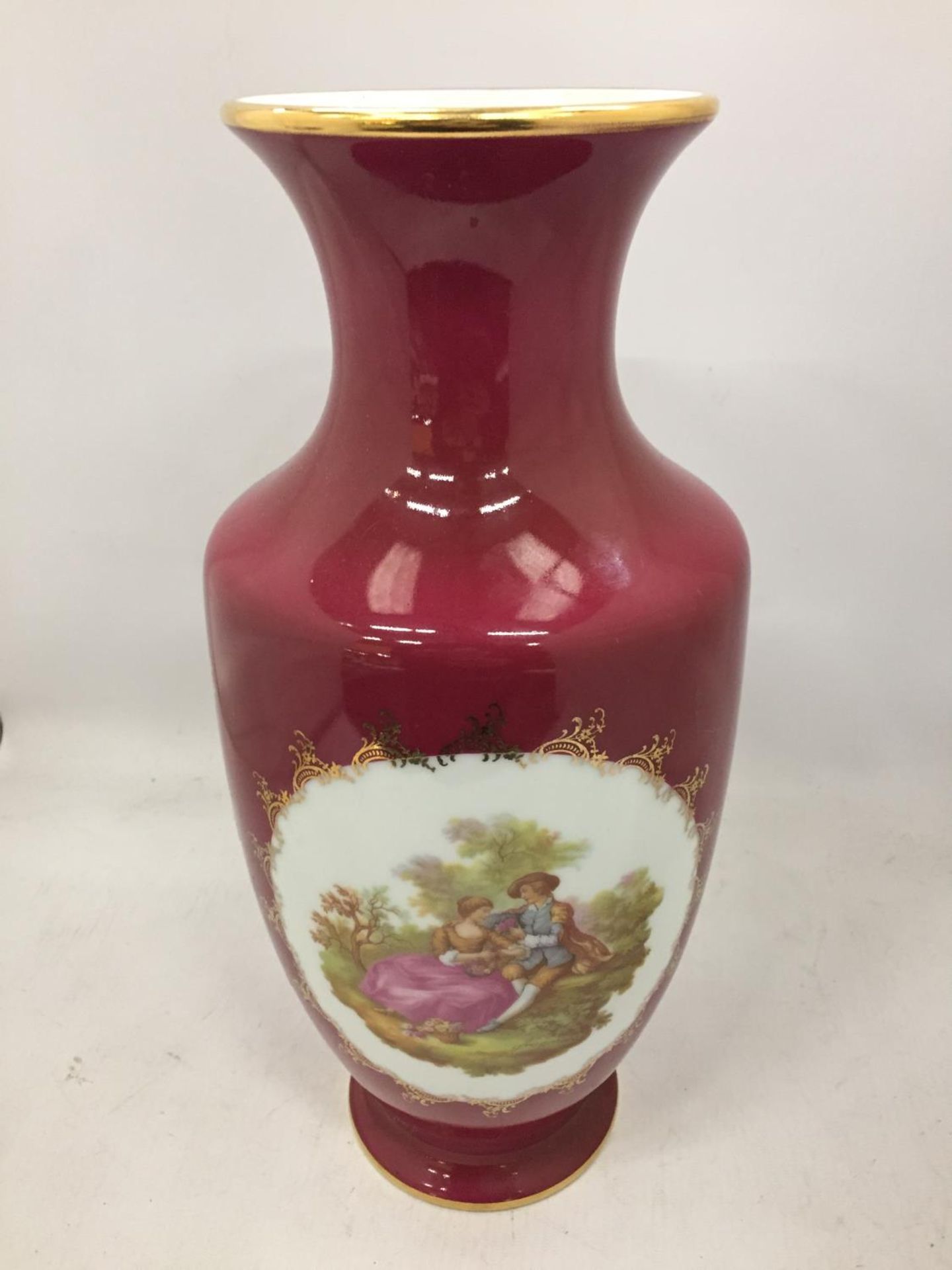 A LARGE LIMOGES CASTEL VASE WITH CLASSICAL DECORATION HEIGHT 35.5CM