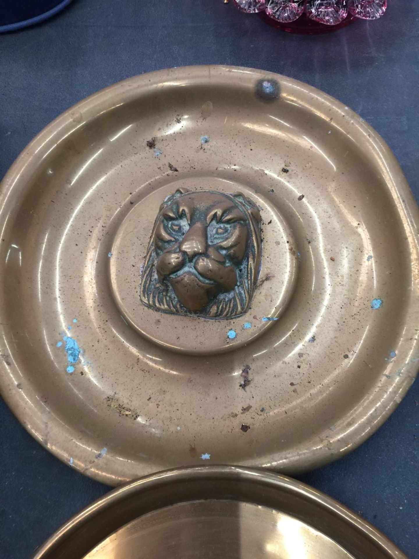 FIVE VINTAGE BRASS WALL PLAQUES, ONE WITH A LIONS HEAD - Image 4 of 4