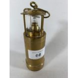 * A BRASS PRESENTATION LAMP FROM ANDERTONS VISIT TO OLDHAM BATTERIES 1982, HEIGHT 12CM