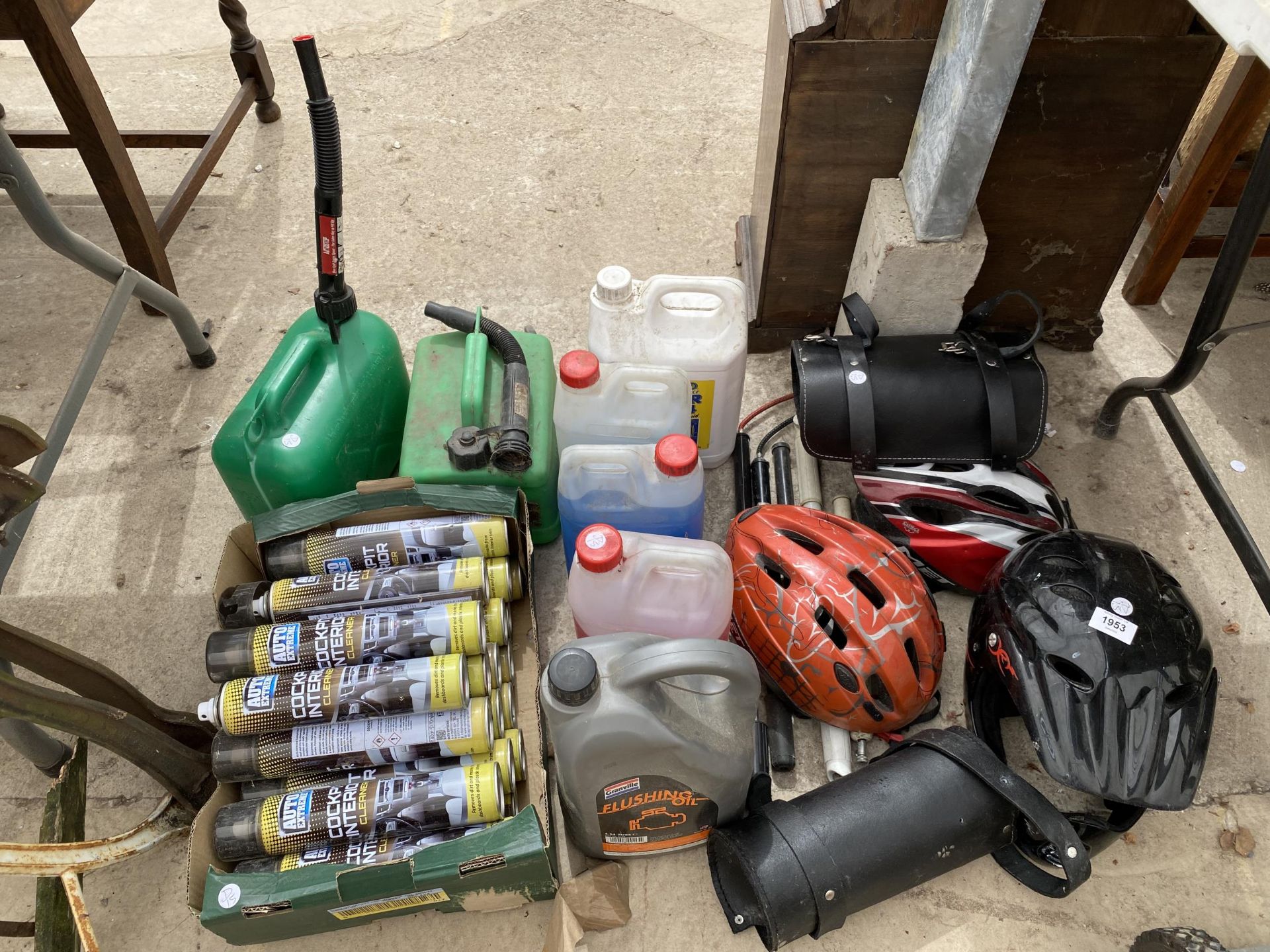 A MIXED LOT TO INCLUDE PETROL CANS, CLEANING SPRAY, BIKE HELMETS ETC