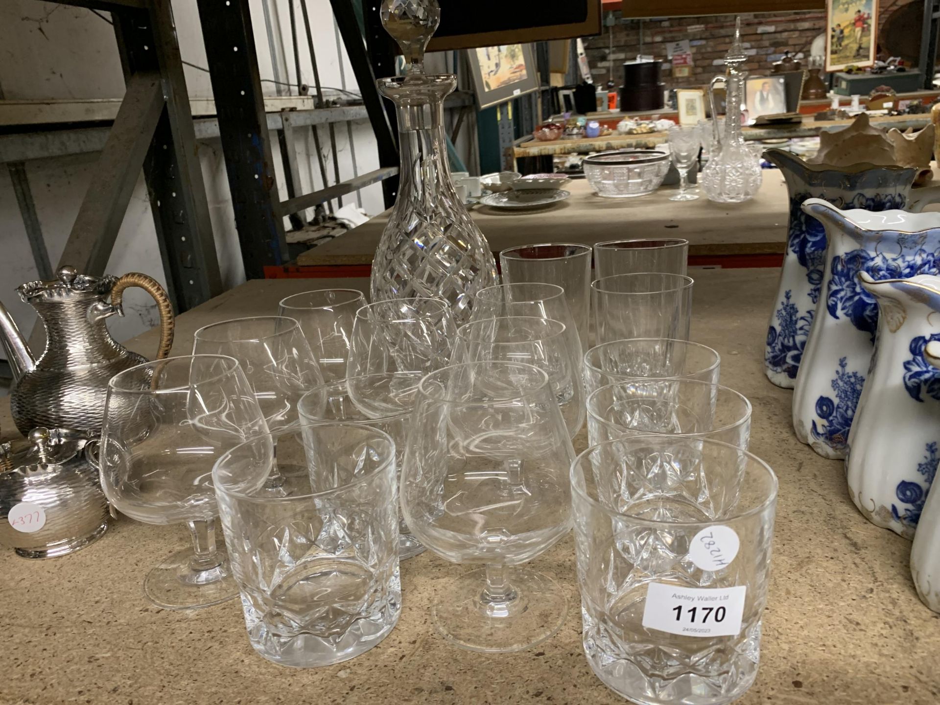 A COLLECTION OF GLASSES AND CUT GLASS DECANTER