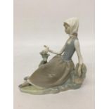 A LLADRO FIGURINE - SHEPHERDESS WITH DOVE - 17 CM