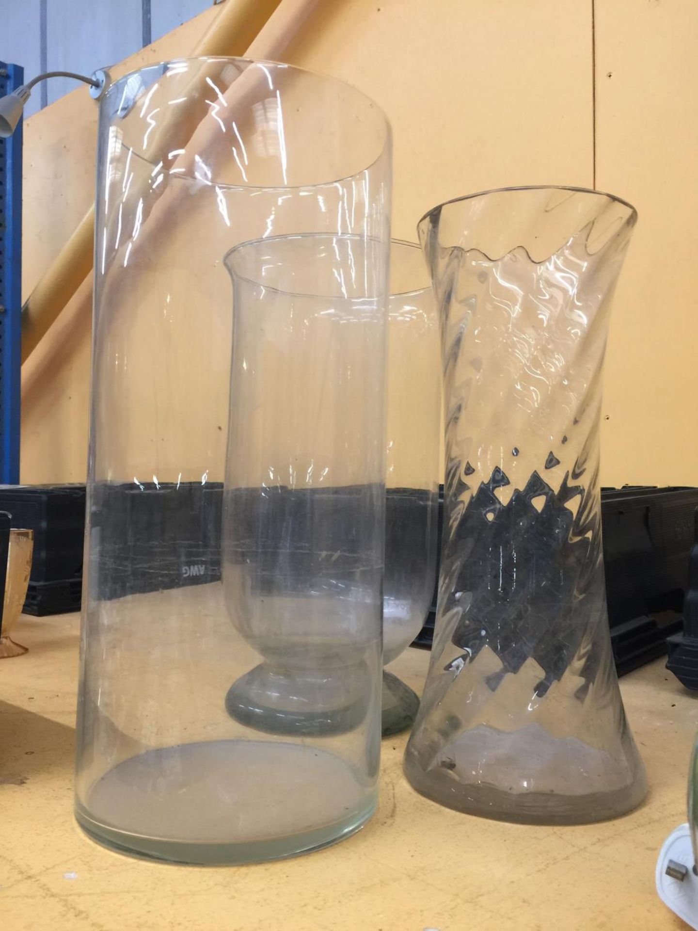 THREE TALL GLASS VASES TO INCLUDE A TWIST DESIGN EXAMPLE