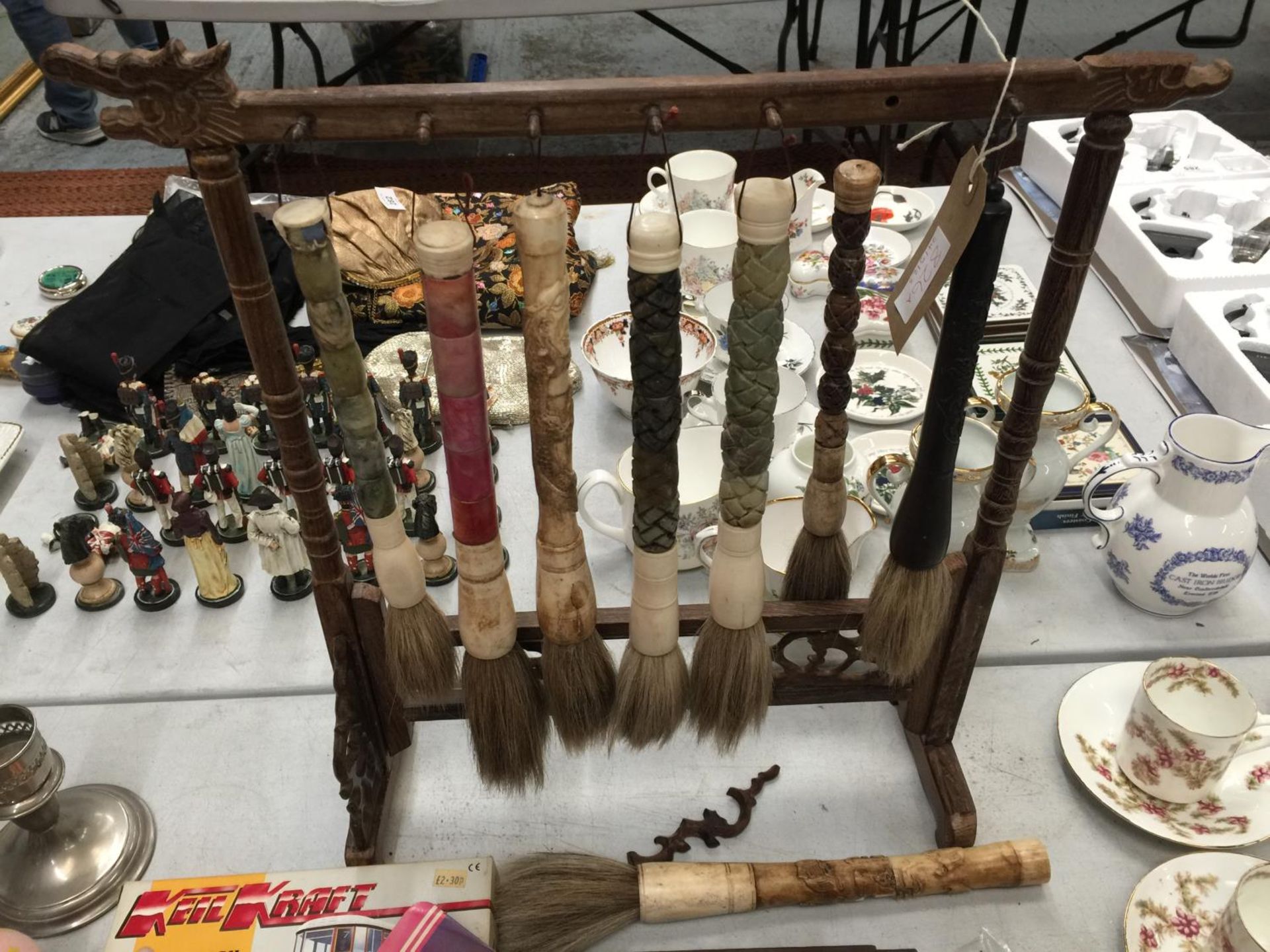 A VINTAGE ORIENTAL CALLIGRAPHY SET WITH STAND AND BRUSHES