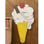 A PAINTED WOODEN ICE CREAM SHOP DISPLAY SIGN