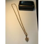 A 9 CARAT GOLD NECKLACE WITH A HEART PENDANT WITH TURQUOISE STONE GROSS WEIGHT 7.54 GRAMS WITH