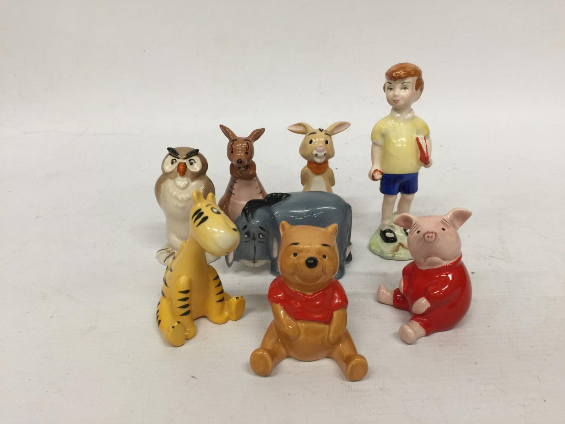 EIGHT DISNEY WINNE THE POOH FIGURES BY BESWICK - TWO WITH GOLD BACKSTAMPS