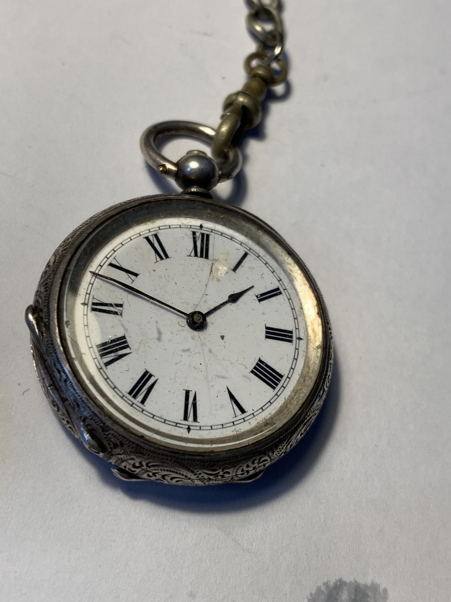 A POCKET WATCH ON A CHAIN WITH A HALLMARKED BIRMINGHAM SILVER FOB - Image 2 of 6