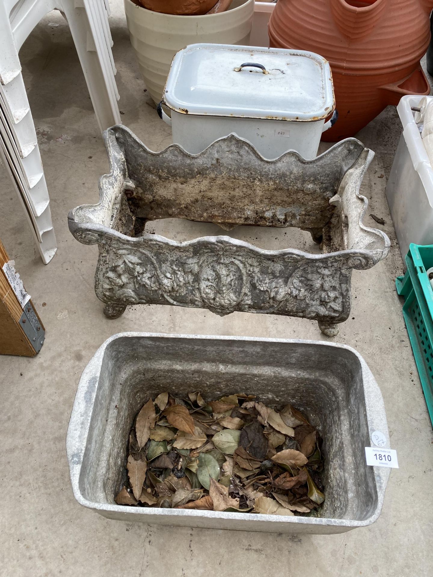 A VINTAGE DECORATIVE METAL PLANTER WITH LINER AND ENAMEL BREAD BIN