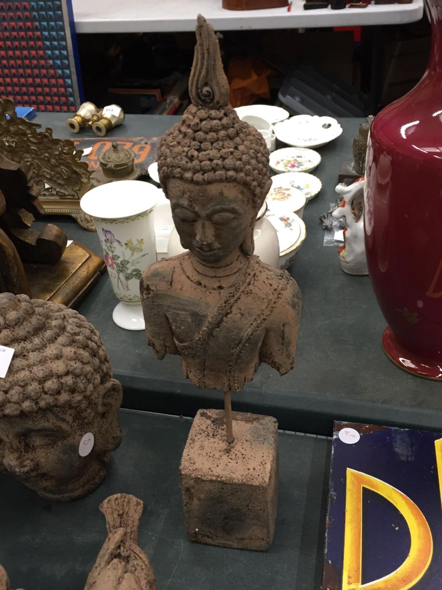 A STONEWARE BUDDAH ON A PLINTH HEIGHT 39.5CM