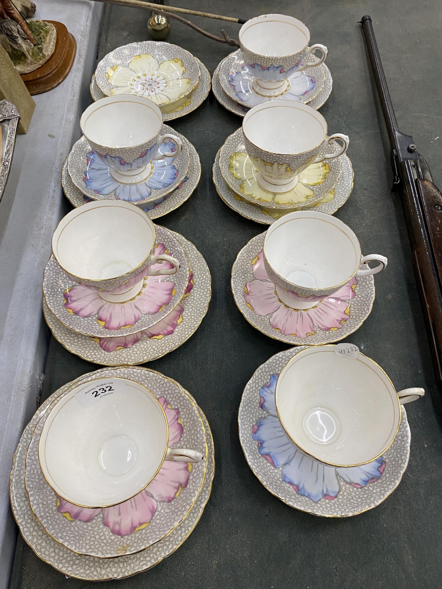 A QUANTITY OF TUSCAN FLORAL PATTERNED CUPS, SAUCERS AND SIDE PLATES