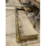 A DECORATIVE BRASS EXTENDABLE FIRE FENDER