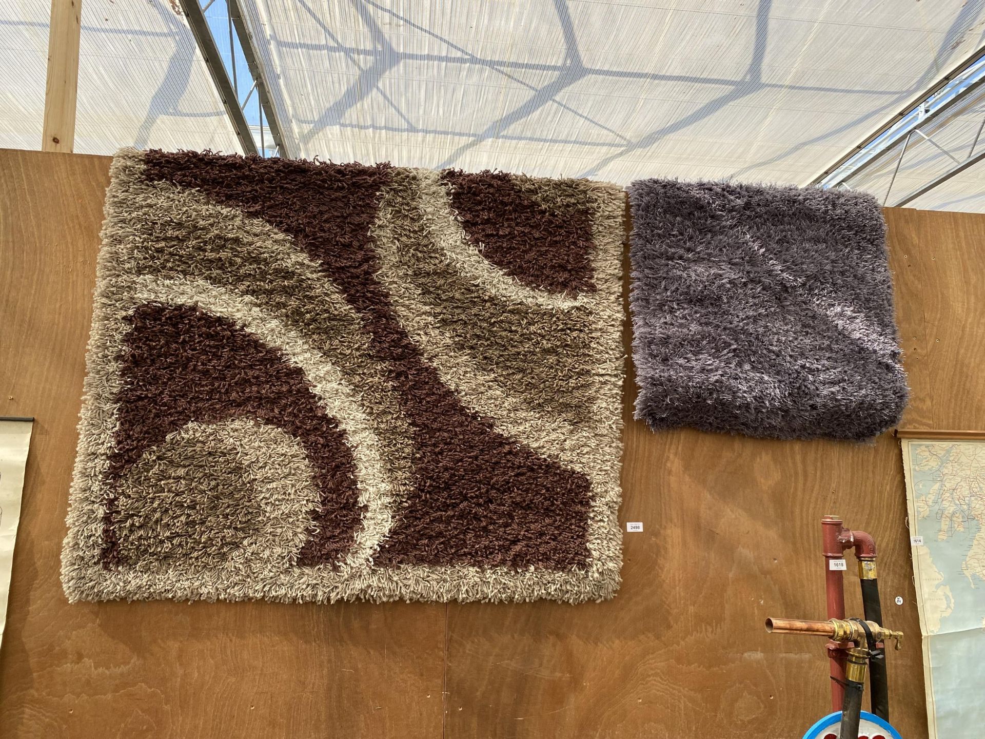 TWO MODERN RUGS TO INCLUDE A CREAM AND BROWN PATTERNED RUG