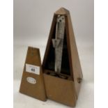 A VINTAGE FRENCH 'PAQUET' WOODEN CASED METRONOME