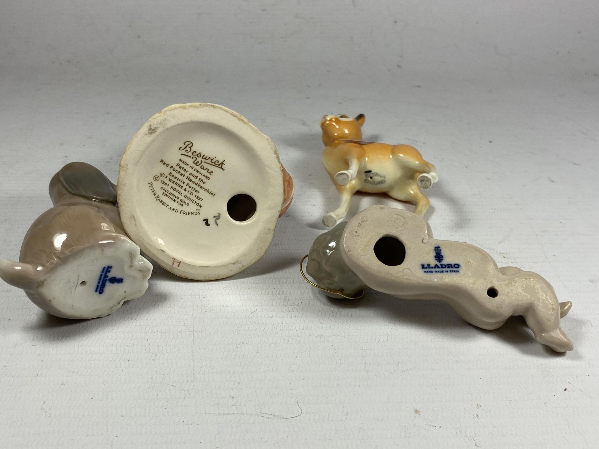 A GROUP OF FOUR CERAMIC FIGURES - LLADRO CHERUB AND DOG, BESWICK BAMBI AND BESWICK BEATRIX POTTER - Image 2 of 2