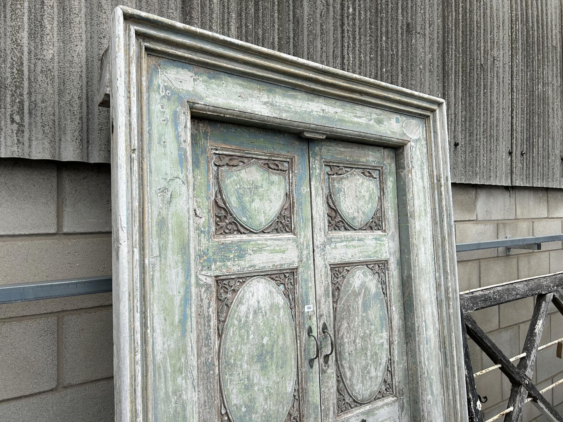 A PAIR OF INDIAN HARDWOOD PANELLED DOORS 89" x 56" TO INCLUDE FRAME WITH BRASS HASP AND HANDLES - Image 2 of 6