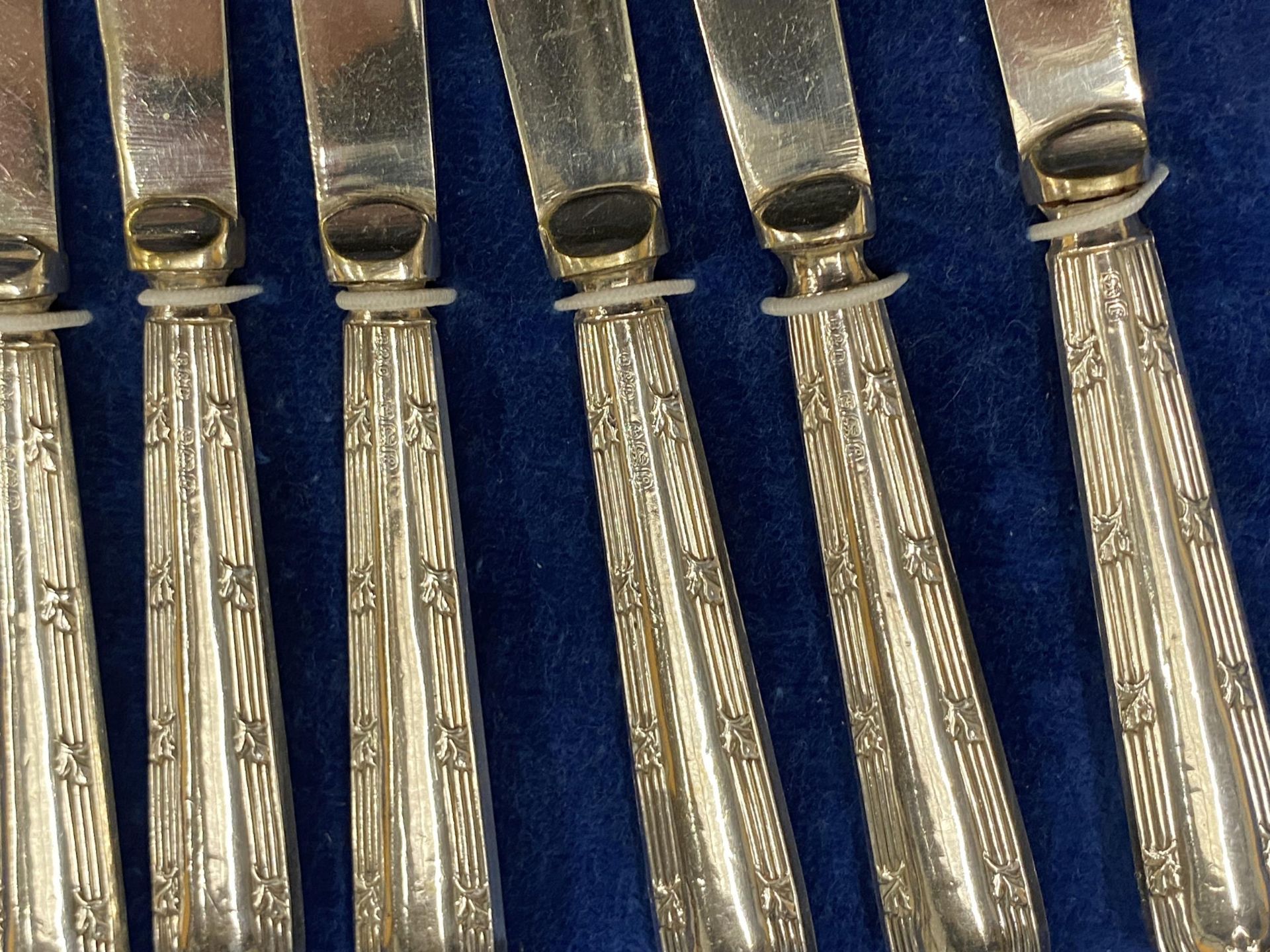 TWO BOXED SILVER ITEMS - FIVE COFFEE SPOONS AND SIX HALLMARKED SILVER HANDLED BUTTER KNIVES - Image 2 of 3